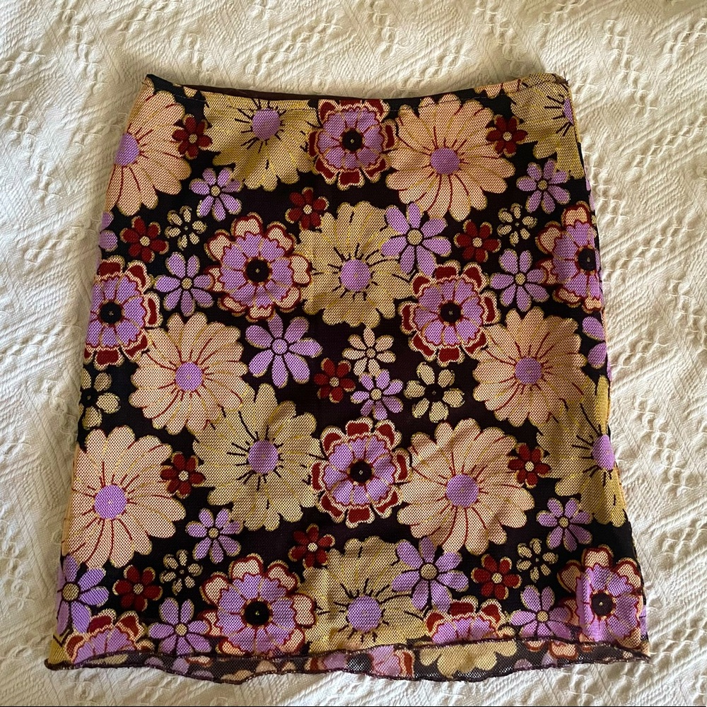 Princesspolly size 2 floral pattern with gold detail mini skirt (very stretchy)